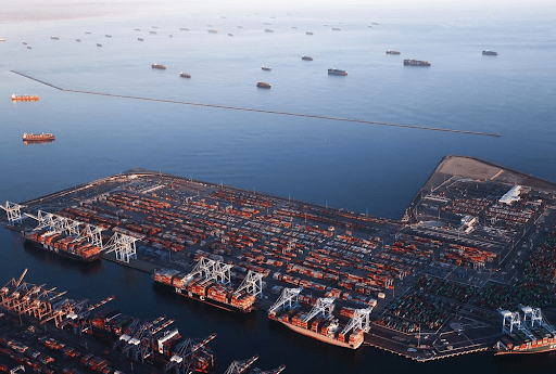 Container ships unloading in Long Bay port