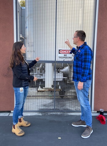 Maik Duwensee and Emily Robinson discuss strategies to improve gas supply to their manufacturing line.