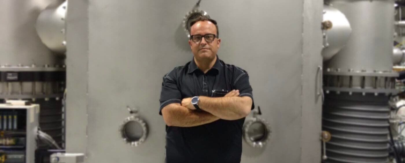 Jeff Lutz, supply chain operations leader, standing in front of industrial equipment