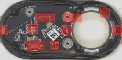 An electronic device with defects highlighted using artificial intelligence algorithms.