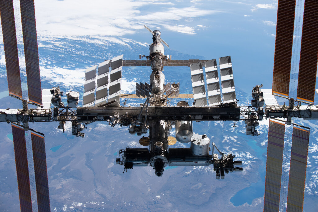 A photo of the International Space Station with Earth in the background